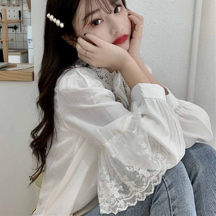 The Korean Lace Up Raffled Blouse